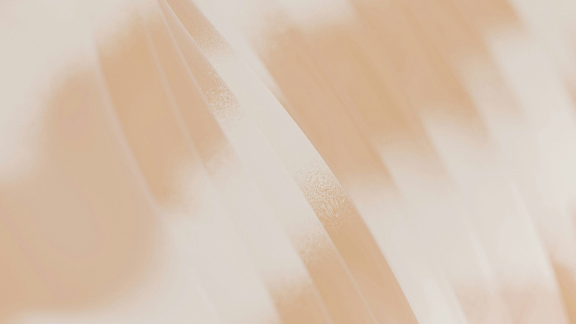 Feine Sandstruktur in Beige als Symbol für Erdung, Ruhe und Stabilität in der Kinesiologie